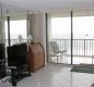 [Image: Beautiful 11th-Floor Oceanfront Condominium]