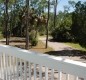 [Image: Private Bayfront Home on 2.5 Acres. Dock with Kayak Launch. $1115/Week Fall Rate]