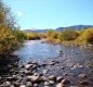 [Image: "Two Dog Chalet" (Snowy Range Mountains / Home on the River)]