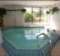 [Image: Elegant Beachfront Resort-Like Condominium with Pool, Spa and]