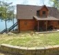 [Image: Beautiful 3BR Modern Log Cabin on Smith Lake with Boat Dock]