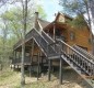 [Image: Beautiful 3BR Modern Log Cabin on Smith Lake with Boat Dock]