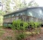 [Image: Immaculate 3BR/2BA Cabin with Deck and Dock]