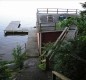 [Image: Authentic 1930s Log House with Sandy Beach &amp; Boats]