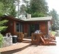 [Image: Northwoods Retreat - Lakeside Cabin]