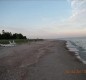 [Image: At the Lake Lake Michigan Cape Cod Home with Sand Beach]