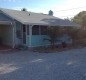 [Image: The Surf Cottage. Walk to Beach, Shops, Dining &amp; Water Sports]