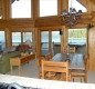 [Image: Lake Front Log Home with Sandy Beach on Lake Coeur D'Alene, Idaho]