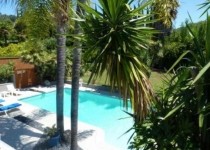 [Image: Large House with Swimming Pool in a Quiet Area]