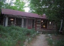 [Image: Authentic 1930s Log House with Sandy Beach &amp; Boats]