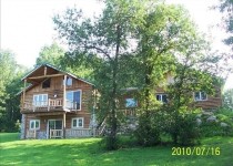 [Image: Spacious Water Front, Log Chalet; Lofted Ceilings, Fireplace]