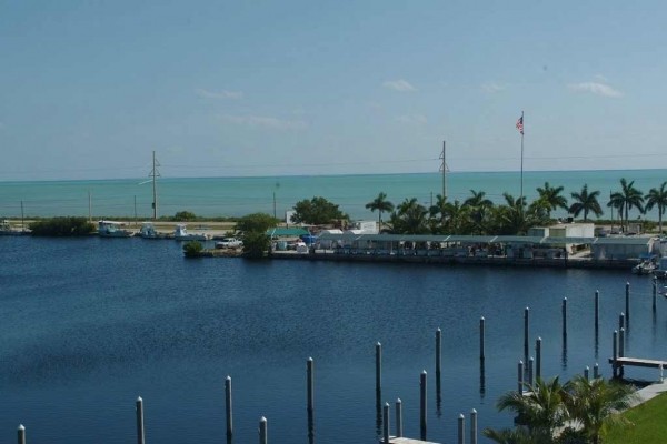 [Image: Luxurious Bay Harbour - Ocean View, Boat Dock, Pool, Jacuzzi &amp; Tennis Courts!]