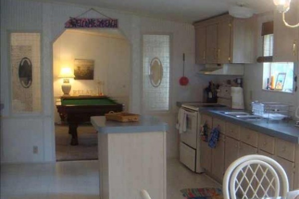 [Image: August Special: $99/Night, Kayaks, Pool Table, Whtie Sands!]