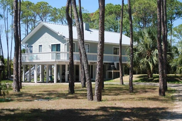 [Image: Private Bayfront Home on 2.5 Acres. Dock with Kayak Launch. $1115/Week Fall Rate]