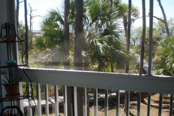 [Image: Private Bayfront Home on 2.5 Acres. Dock with Kayak Launch. $1115/Week Fall Rate]