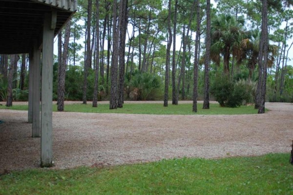 [Image: Private Bayfront Home on 2.5 Acres. Dock with Kayak Launch. $1115/Week Fall Rate]