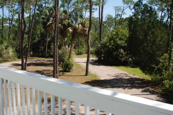 [Image: Private Bayfront Home on 2.5 Acres. Dock with Kayak Launch. $1115/Week Fall Rate]