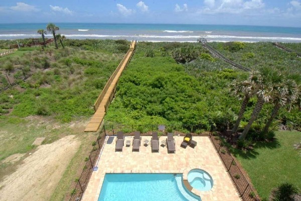 [Image: Cinnamon Beach Tiki Tides, Ocean Front, 7 Bedrooms, Pool, Spa, Tiki Bar]