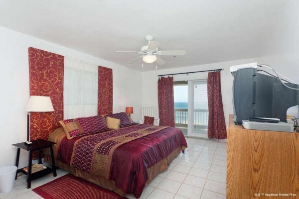 [Image: Miracle Eight - 8 Bedrooms, Sleeps 26, Beach Front]