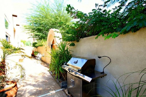 [Image: 'Dorado' 3 Bedroom, 3 Bath Home with Intimate Yard and Tranquil Water Features]