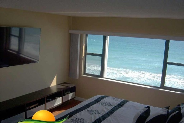 [Image: Paradise Vacation Rental - 0% Stress. Absolutely Gorgeous Beachfront Condo]