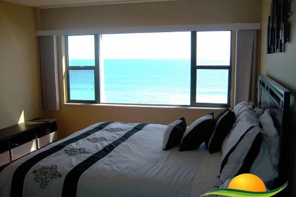 [Image: Paradise Vacation Rental - 0% Stress. Absolutely Gorgeous Beachfront Condo]