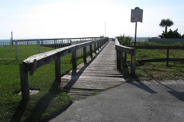 [Image: Walk to the Beach or the Playground Within Minutes from This Adorable Home.]