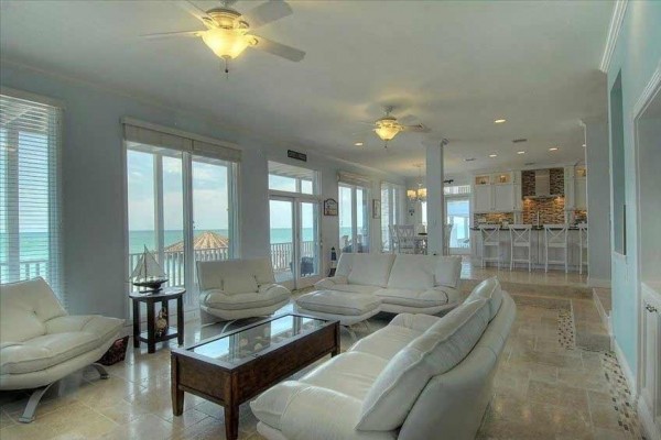 [Image: Elegant Oceanfront Estate Home in Private Gated Community]