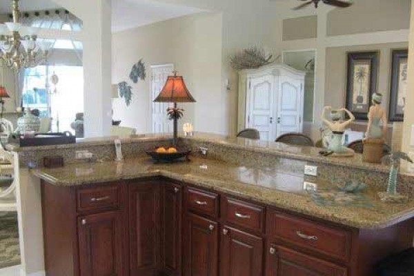 [Image: Golfers Paradise Elegant Pool Home in Pristine Condition in Gated Golf Community]