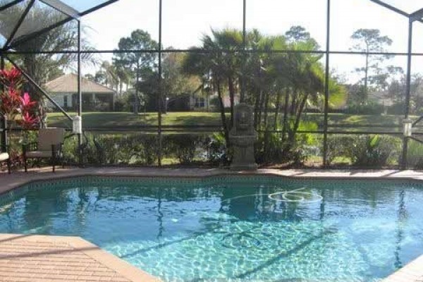 [Image: Golfers Paradise Elegant Pool Home in Pristine Condition in Gated Golf Community]