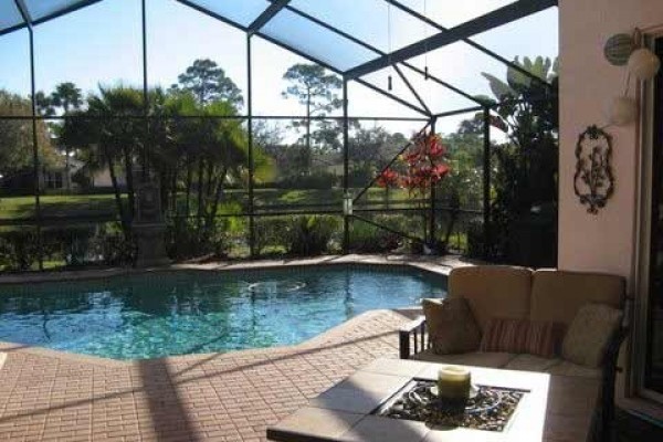 [Image: Golfers Paradise Elegant Pool Home in Pristine Condition in Gated Golf Community]