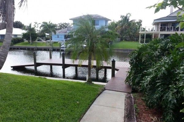 [Image: Upscale Waterfront Home with Manatees in Your Back Yard]