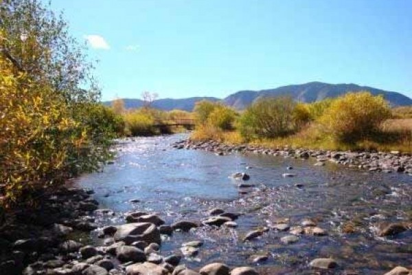 [Image: "Two Dog Chalet" (Snowy Range Mountains / Home on the River)]