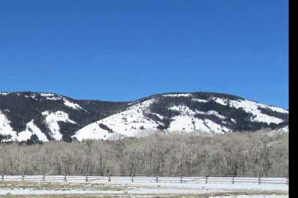 [Image: Mountain Valley Getaway Enjoy a Peaceful Setting with Views of the Snowy Range]