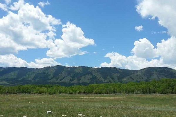 [Image: Mountain Valley Getaway Enjoy a Peaceful Setting with Views of the Snowy Range]