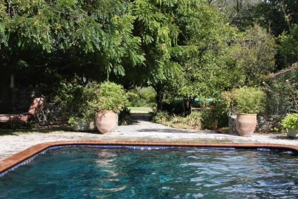 [Image: Family Friendly Sanctuary Near Mountains with Pool 3BR and Full Guest House]