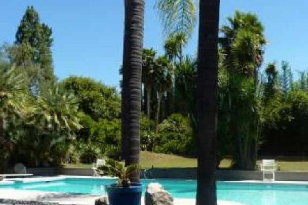 [Image: Large House with Swimming Pool in a Quiet Area]