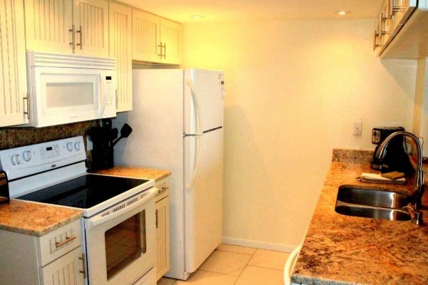 [Image: Completely Renovated Cape Canaveral Direct Ocean 2BR Condo with Pool.]