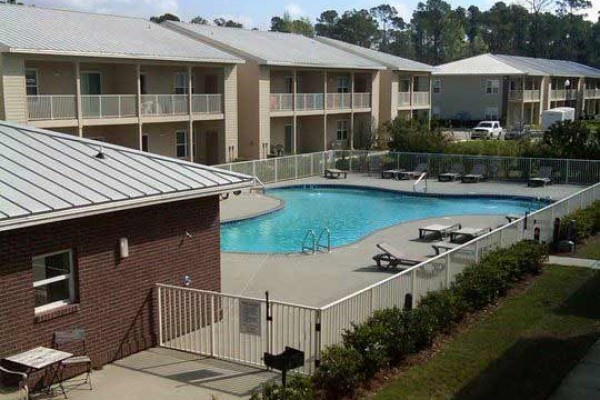 [Image: Beautiful Furnished Unit Overlooking Pool]