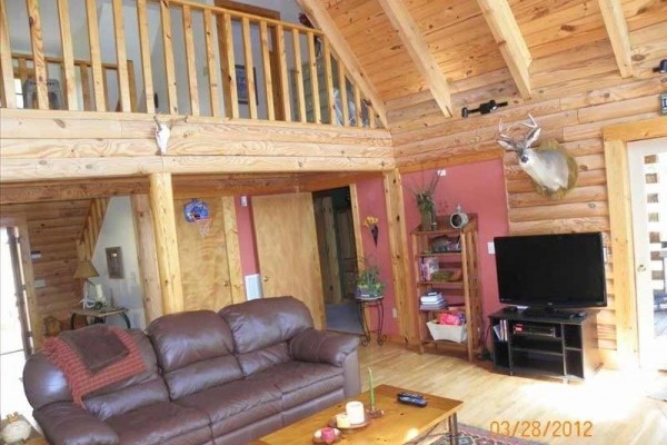 [Image: Beautiful 3BR Modern Log Cabin on Smith Lake with Boat Dock]