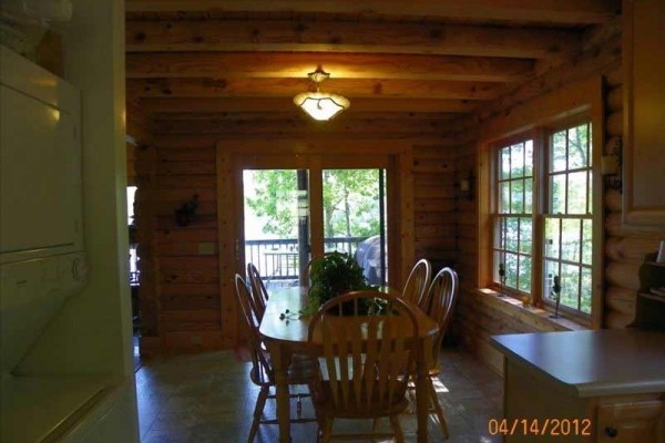 [Image: Beautiful 3BR Modern Log Cabin on Smith Lake with Boat Dock]