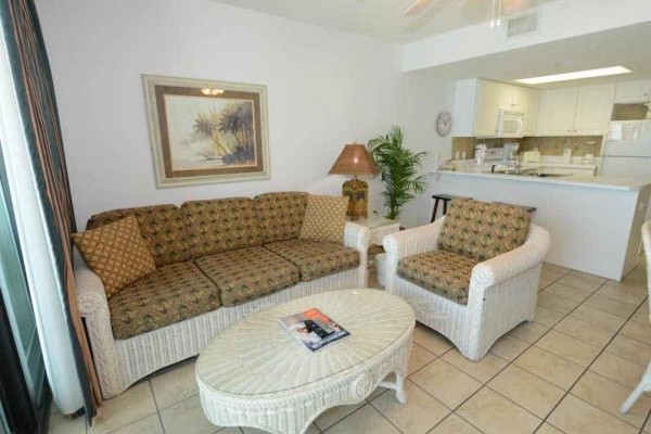 [Image: Suite Kitchen! Book Today! Beach Front Balcony! Mid-Week Specials Running Now!]