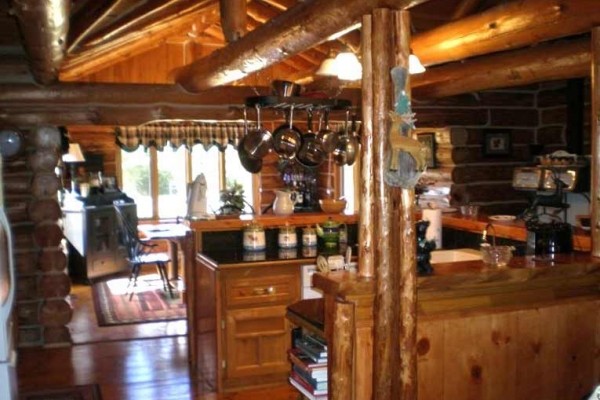 [Image: Vacation in Our Beautiful River Front Log Cabin!]