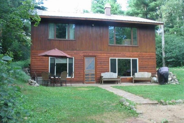 [Image: Large Cabin in the North Woods of Wisconsin on Quiet Lake]