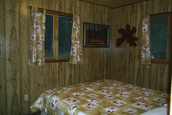 [Image: Large Cabin in the North Woods of Wisconsin on Quiet Lake]