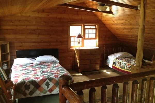 [Image: Historic Log Cabin on Beautiful, Private Lake of the Falls]