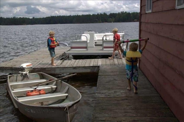 [Image: Authentic 1930s Log House with Sandy Beach &amp; Boats]