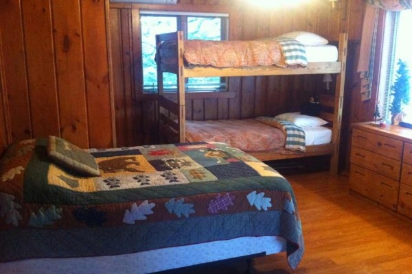 [Image: Northwoods Retreat - Lakeside Cabin]