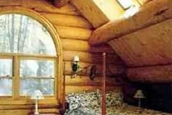 [Image: Rustic Luxury in a Modern Full Log Home]