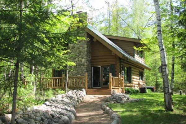 [Image: Rustic Wooded Lake Seclusion in a Cozy Log Cabin]